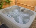 Relax in your Hot Tub with a glass of wine at Old Castle Farm - Castle Clover; Shropshire