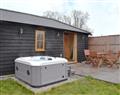 Relax in your Hot Tub with a glass of wine at Old Chalksole Cottages - Dairy Cottage; Kent