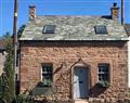 Enjoy a glass of wine at Old Cobblers Cottage; Cumbria