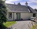 Enjoy a glass of wine at Old Manse Cottage; Ross-Shire