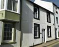 Enjoy a glass of wine at Old Town Cottage; Keswick; Cumbria