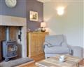 Enjoy a glass of wine at Pear Tree Cottage; Derbyshire