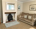 Enjoy a glass of wine at Pen Y Frith Bungalow; ; Prestatyn