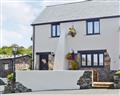 Enjoy a glass of wine at Pencrennow Farm Cottages - Swallow Cottage; Cornwall