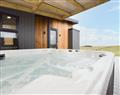 Relax in your Hot Tub with a glass of wine at Pirleyhill Pods - Penkill; Ayrshire