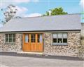 Enjoy a glass of wine at Prideaux Farm Cottages - The Wagon House; Cornwall