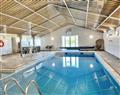 Relax in your Hot Tub with a glass of wine at Primrose; Devon