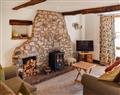 Enjoy a glass of wine at Quince Cottage; Cumbria
