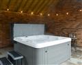 Relax in your Hot Tub with a glass of wine at Ranby Cottage Farm - Cow Slip; Nottinghamshire