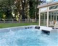 Relax in your Hot Tub with a glass of wine at Rectory Cottage; Lincolnshire