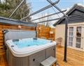 Relax in your Hot Tub with a glass of wine at Red Brick Retreat; ; Diss