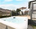 Relax in your Hot Tub with a glass of wine at Red Kite Lodge; ; St Fillians