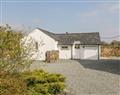 Relax in your Hot Tub with a glass of wine at Rhos Y Foel Cottage; ; Nefyn