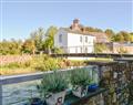 Enjoy a glass of wine at Riverside Cottage; Cumbria