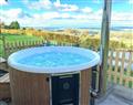 Relax in your Hot Tub with a glass of wine at Rodda Meadow; Cornwall