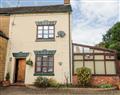 Relax in your Hot Tub with a glass of wine at Rose Cottage; ; Forsbrook