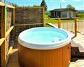 Relax in a Hot Tub at Saxon Maybank - The Cow Shed; Dorset