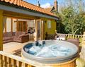 Lay in a Hot Tub at Serenity Cottages - Owls Hoot; Suffolk