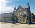 Enjoy a glass of wine at Sherwood House Apartment 3; Derbyshire