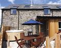 Relax in your Hot Tub with a glass of wine at Smithy Barn; Abergele; Clwyd