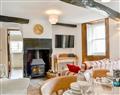 Enjoy a glass of wine at Sommersby Cottage; Cumbria