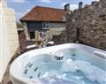 Relax in a Hot Tub at Southcott Farm Cottage; ; Sheldon