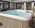 Relax in your Hot Tub with a glass of wine at Strathaven Holiday Park - Tropical Dreams; Lanarkshire