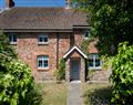 Enjoy a glass of wine at Teacher’s Cottage; Oxwich; Gower