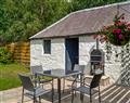 Relax in your Hot Tub with a glass of wine at Terraughtie Cottage West; Dumfriesshire