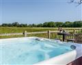Relax in your Hot Tub with a glass of wine at The Barn; West Sussex
