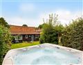 Relax in your Hot Tub with a glass of wine at The Barn; Norfolk