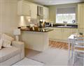 Enjoy a glass of wine at The Canterbury Cottages - The Canterbury Hideaway; Kent