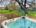 Relax in your Hot Tub with a glass of wine at The Coach House; Lancashire