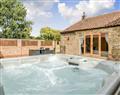Lay in a Hot Tub at The Coach House; Norfolk