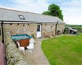 Relax in your Hot Tub with a glass of wine at The Fauld; Cumbria