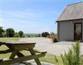 Enjoy a glass of wine at The Garden Apartment; Cornwall