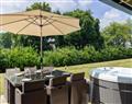 Relax in your Hot Tub with a glass of wine at The Glasshouse; Malmesbury; Wiltshire