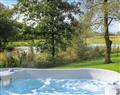 Relax in your Hot Tub with a glass of wine at The Lodge; Llandeilo; Dyfed