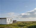 Relax at The Old Log Cabin; Dungeness, near New Romney; England