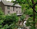 Relax in your Hot Tub with a glass of wine at The Old Water Mill; ; Garnett Bridge