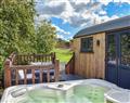 Lay in a Hot Tub at The Retreat; Clwyd