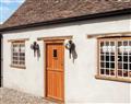 Enjoy a glass of wine at The Tack Room Cottage; Dorset