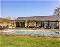 Relax in your Hot Tub with a glass of wine at Tile Cottage and Pool House; ; Wyck Rissington near Lower Slaughter
