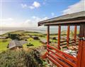 Enjoy a glass of wine at Top Of The World Lodge; ; Aberdovey