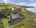 Enjoy a glass of wine at Towyn Cottage; Abereiddy; Pembrokeshire