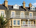 Enjoy a glass of wine at Trem Y Mor; Gwynedd