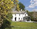 Enjoy a glass of wine at Troutbeck Valley Cottage; Windermere; Cumbria