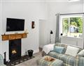 Enjoy a glass of wine at Tyn Giat Cottage; Gwynedd