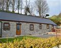 Relax in your Hot Tub with a glass of wine at Tynrhelyg Cottages - Eithinog; Dyfed