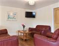 Enjoy a glass of wine at Urswick Road Cottages - Bramble Cottage; Cumbria
